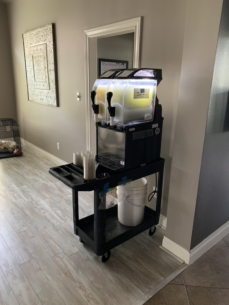 Frozen drink machine rental set up and ready in a customer’s home